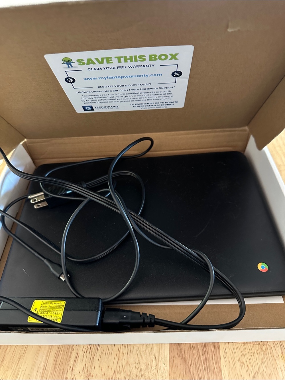 Google Black Chromebook with Charger and Chrome Logo